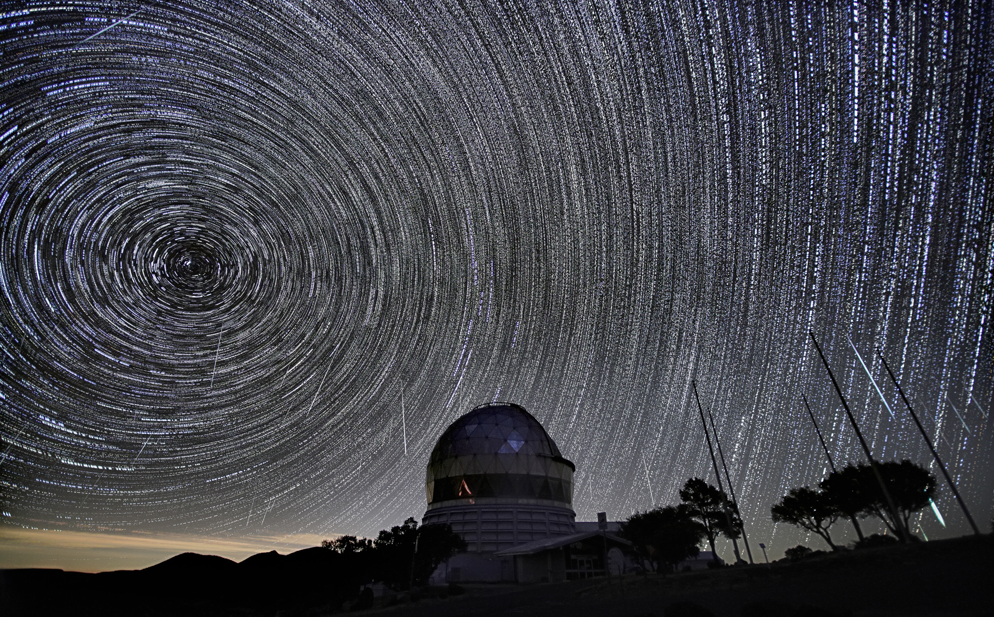 Star and Geminid meteor trails above the Hobby-Eberly Telescope
